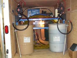 NAP HF2K6 sprayfoam heated hose in rack Graco E20 proportioner unit Donaldson variable flow air dryer Rolair Compressor Husky 1040 drum pumps